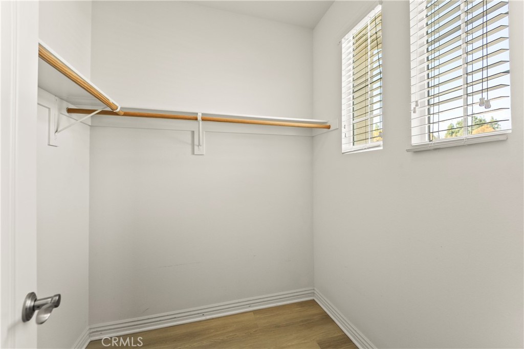 9719 La Vine Court Rancho Cucamonga, CA 91701 - Photo 30 of 39 a view of a room with rack on the wall and a window