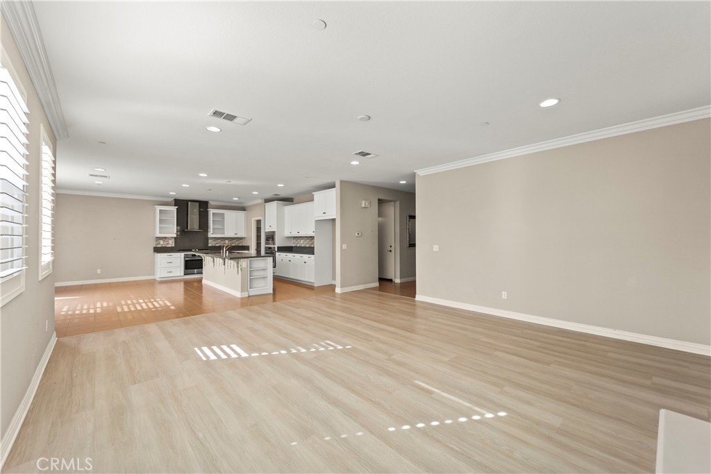 9719 La Vine Court Rancho Cucamonga, CA 91701 - Photo 7 of 39 a view of kitchen with wooden floor