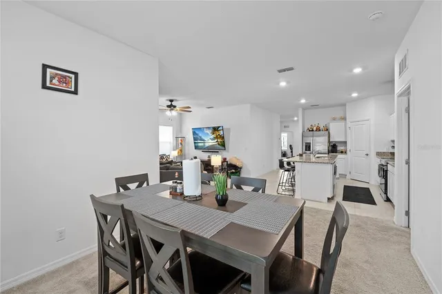 a view of a dining room with furniture