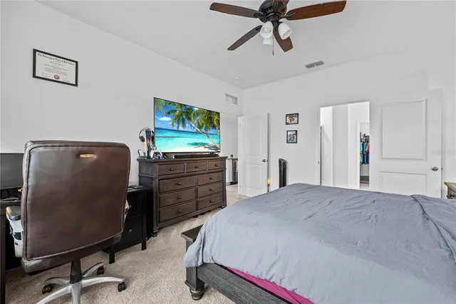 a bedroom with a bed and furniture