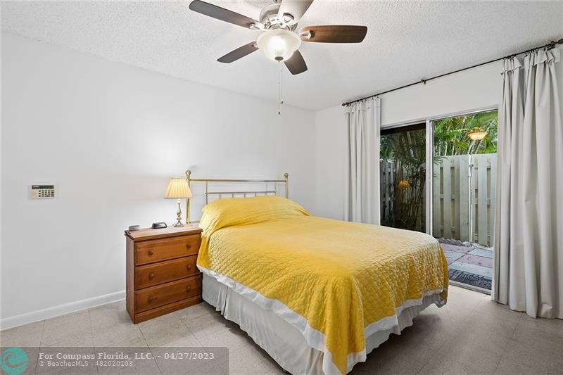 Timberwalk Boca Raton, FL 33428 - Photo 23 of 35 a bedroom with a bed and window