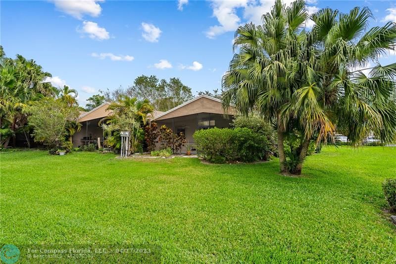 Timberwalk Boca Raton, FL 33428 - Photo 6 of 35 a view of a garden with a house