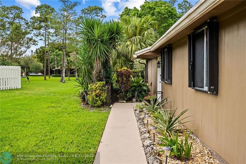 Timberwalk Boca Raton, FL 33428 - Photo 7 of 35 a view of a back yard of the house