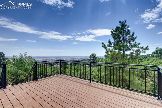 5335 Old Star Ranch View Colorado Springs, CO 80906 - Photo 5 of 13 Upgraded metal railing, expanded composite deck