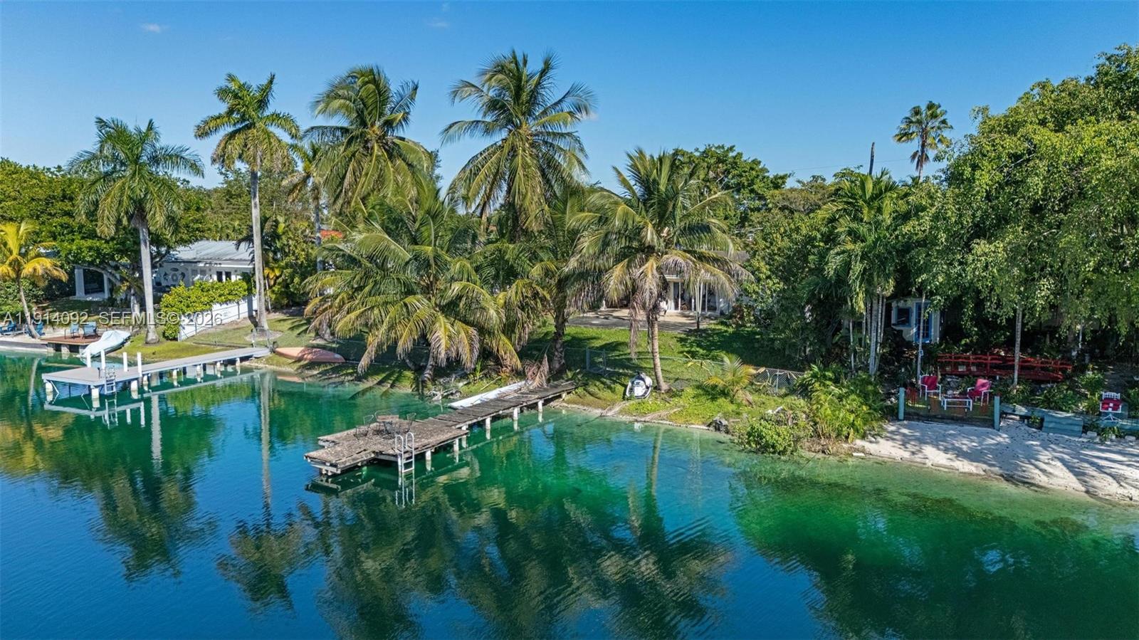 5110 Southwest 92nd Avenue Miami, FL 33165 - Photo 9 of 20 a view of backyard with a table and chairs and potted plants