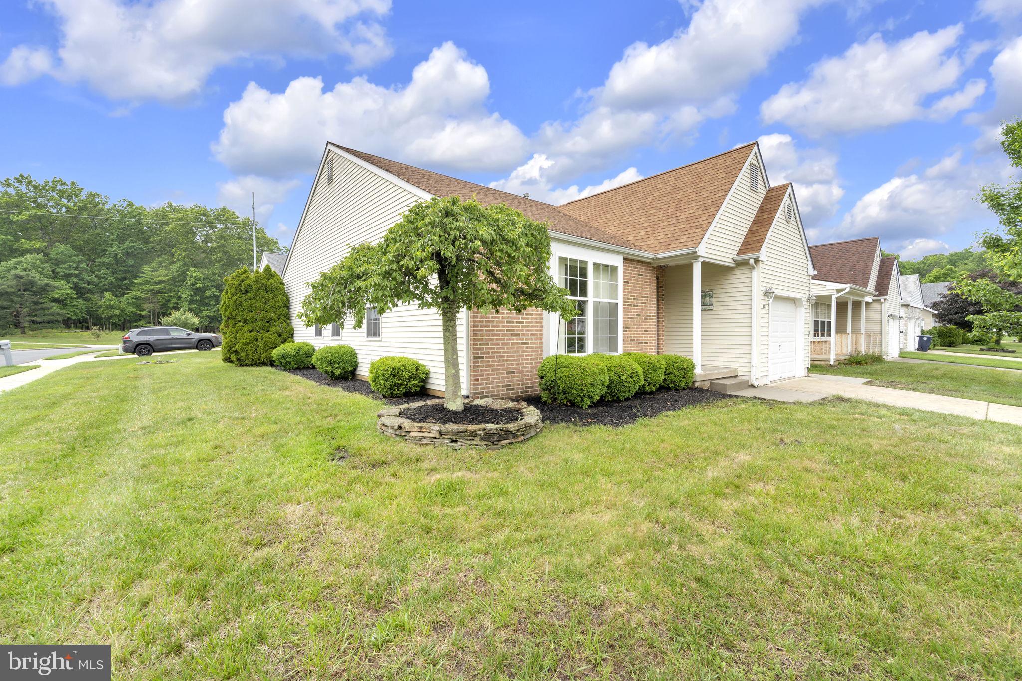801 Freeport Way Williamstown, NJ 08094 - Photo 3 of 29 a view of a house with a yard and street