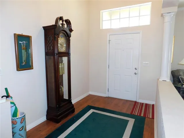 view of room with window and wooden floor