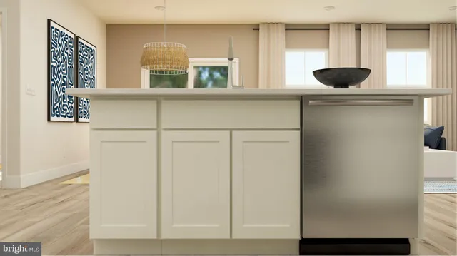 a kitchen with a refrigerator and a window