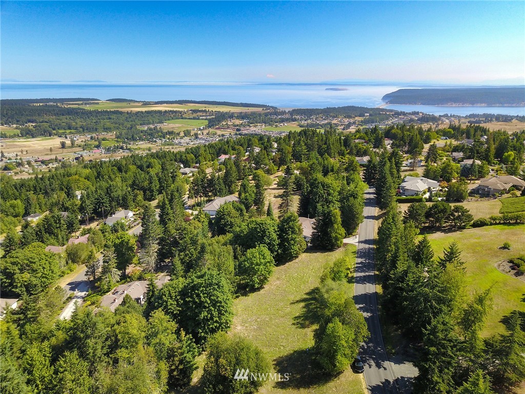 9999 Ravens Ridge Road Sequim, WA 98382 - Photo 8 of 40 a view of city and ocean