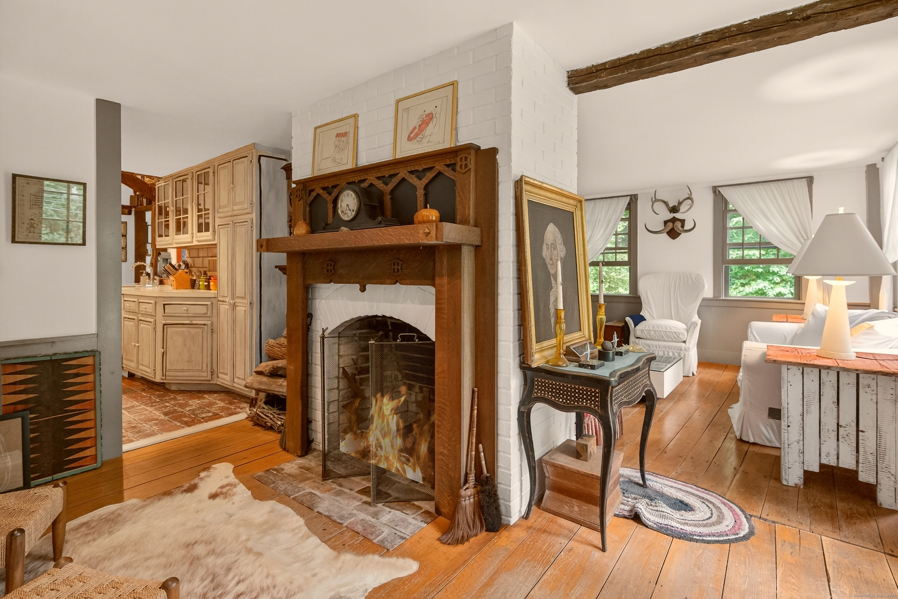 50 Southbury Road Roxbury, CT 06783 - Photo 9 of 31 a view of a livingroom with furniture and a fireplace