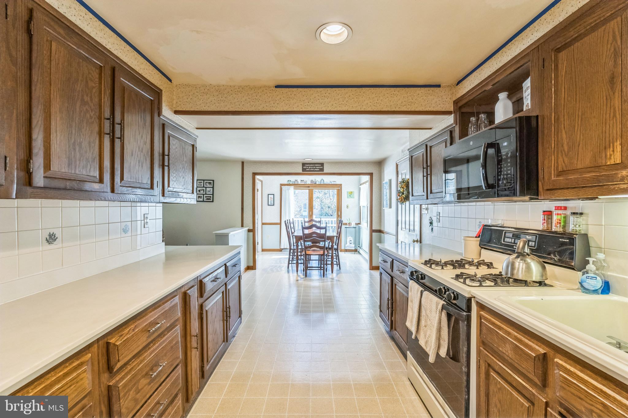 502 Willow Road Oreland, PA 19075 - Photo 9 of 37 Kitchen leads to a bright breakfast nook.
