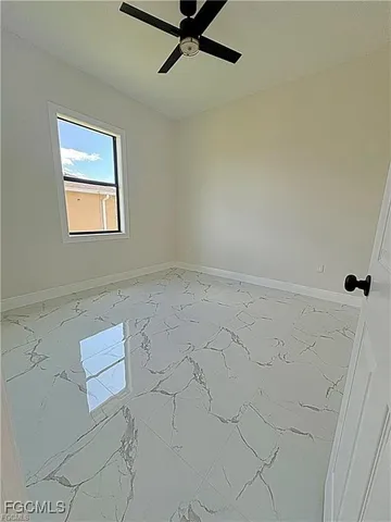 a view of a window in an empty room