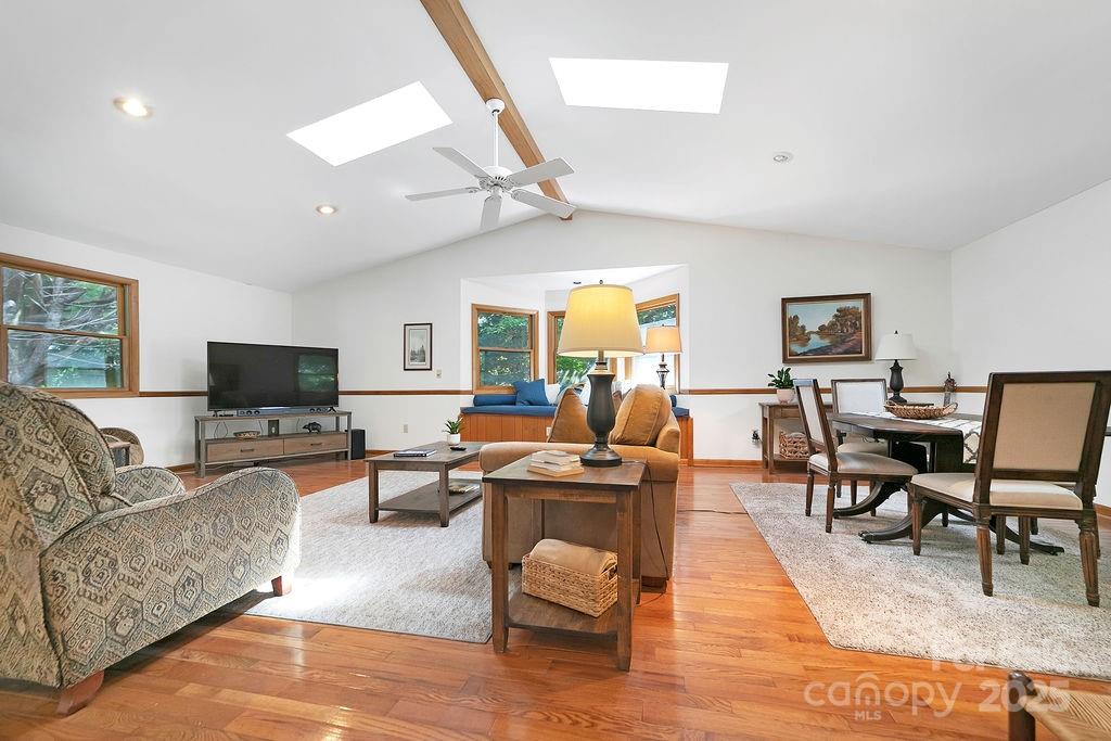 58 Warwaseeta Court Brevard, NC 28712 - Photo 12 of 48 a living room with furniture wooden floor and a flat screen tv