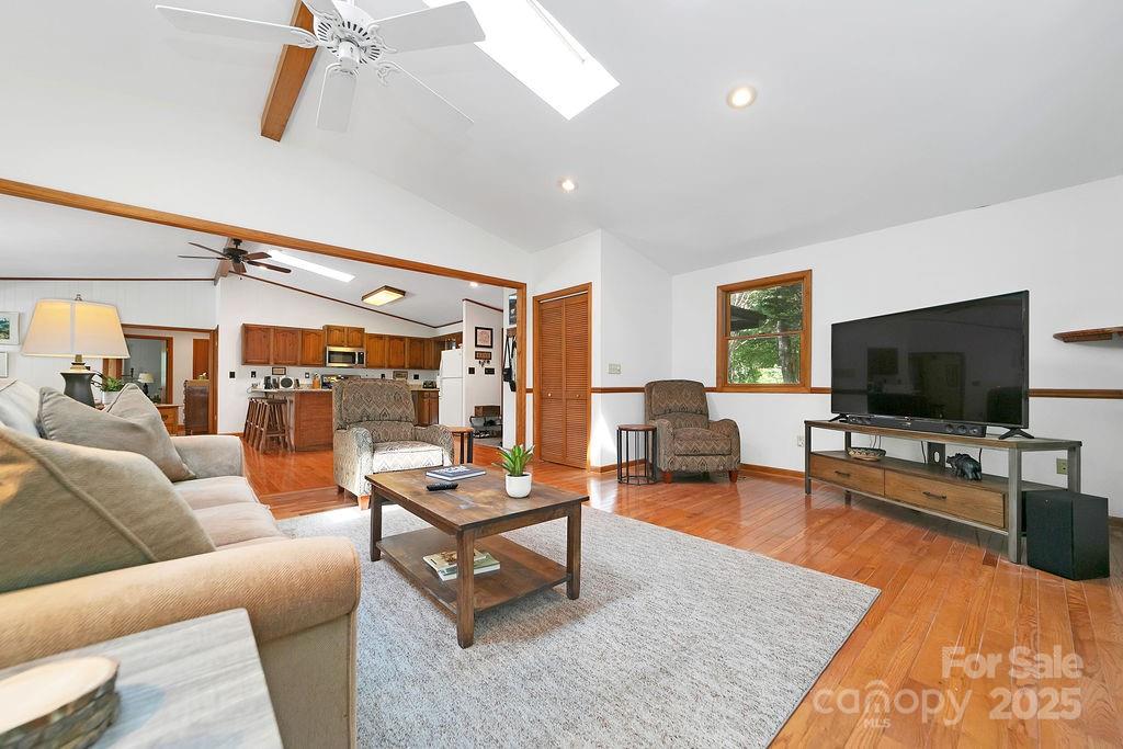 58 Warwaseeta Court Brevard, NC 28712 - Photo 16 of 48 a living room with furniture and a flat screen tv