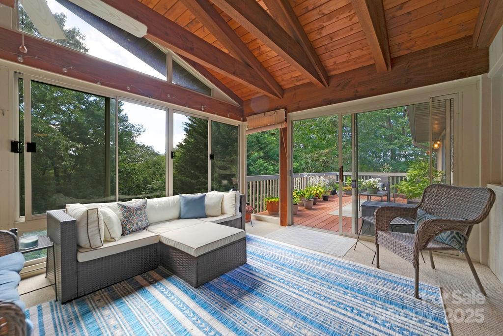 58 Warwaseeta Court Brevard, NC 28712 - Photo 25 of 48 a balcony with furniture and wooden floor