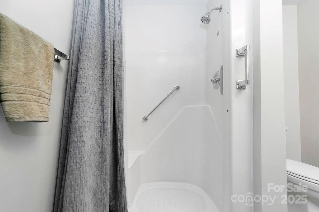 58 Warwaseeta Court Brevard, NC 28712 - Photo 32 of 48 a bathroom with a shower