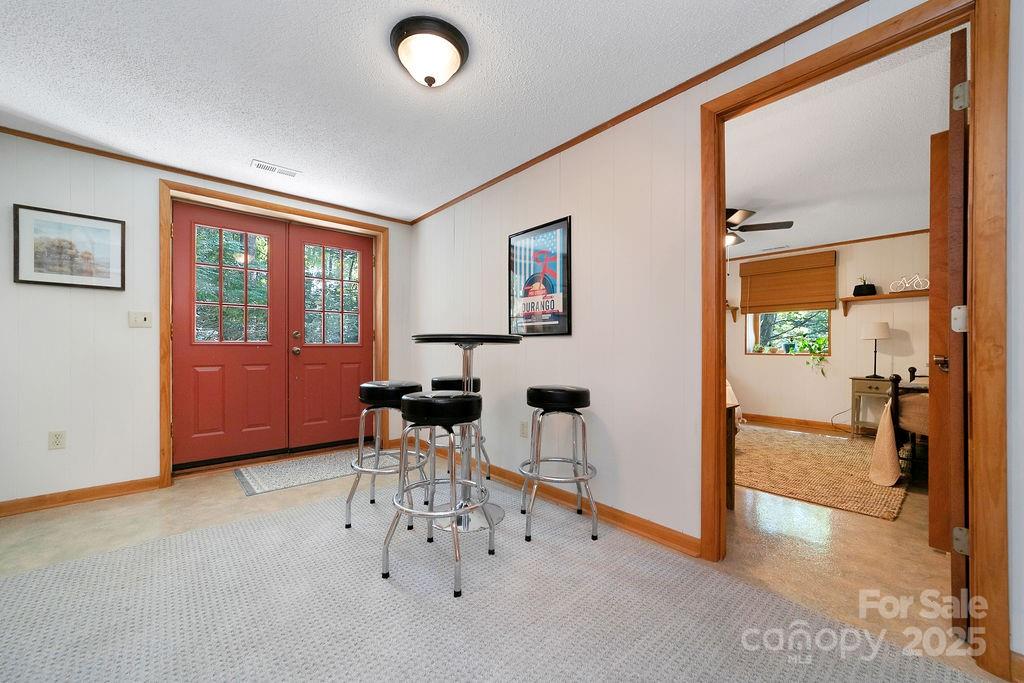 58 Warwaseeta Court Brevard, NC 28712 - Photo 41 of 48 a view of an empty room with furniture and a window