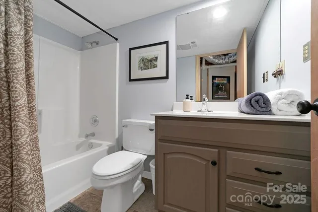 a view of outdoor space with signage and flags