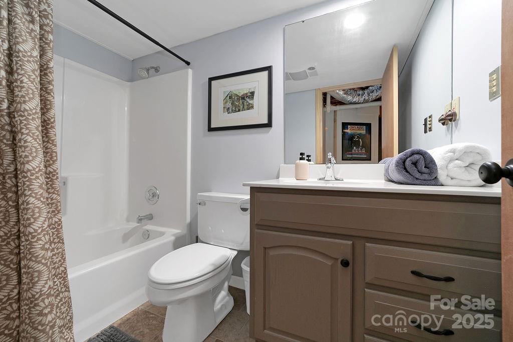 58 Warwaseeta Court Brevard, NC 28712 - Photo 45 of 48 a bathroom with a toilet a sink and a bathtub