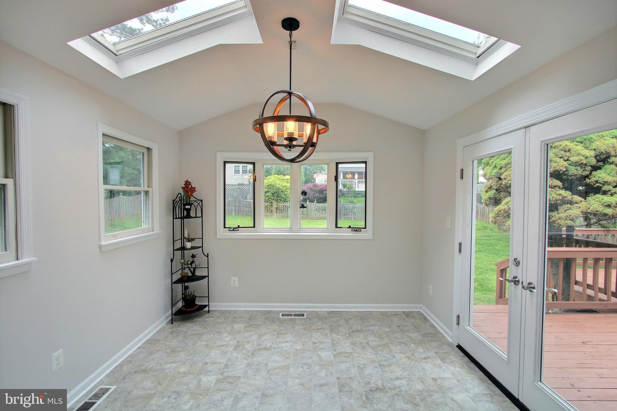 813 Pointer Ridge Drive Gaithersburg, MD 20878 - Photo 15 of 43 a view of entryway with window and stairs