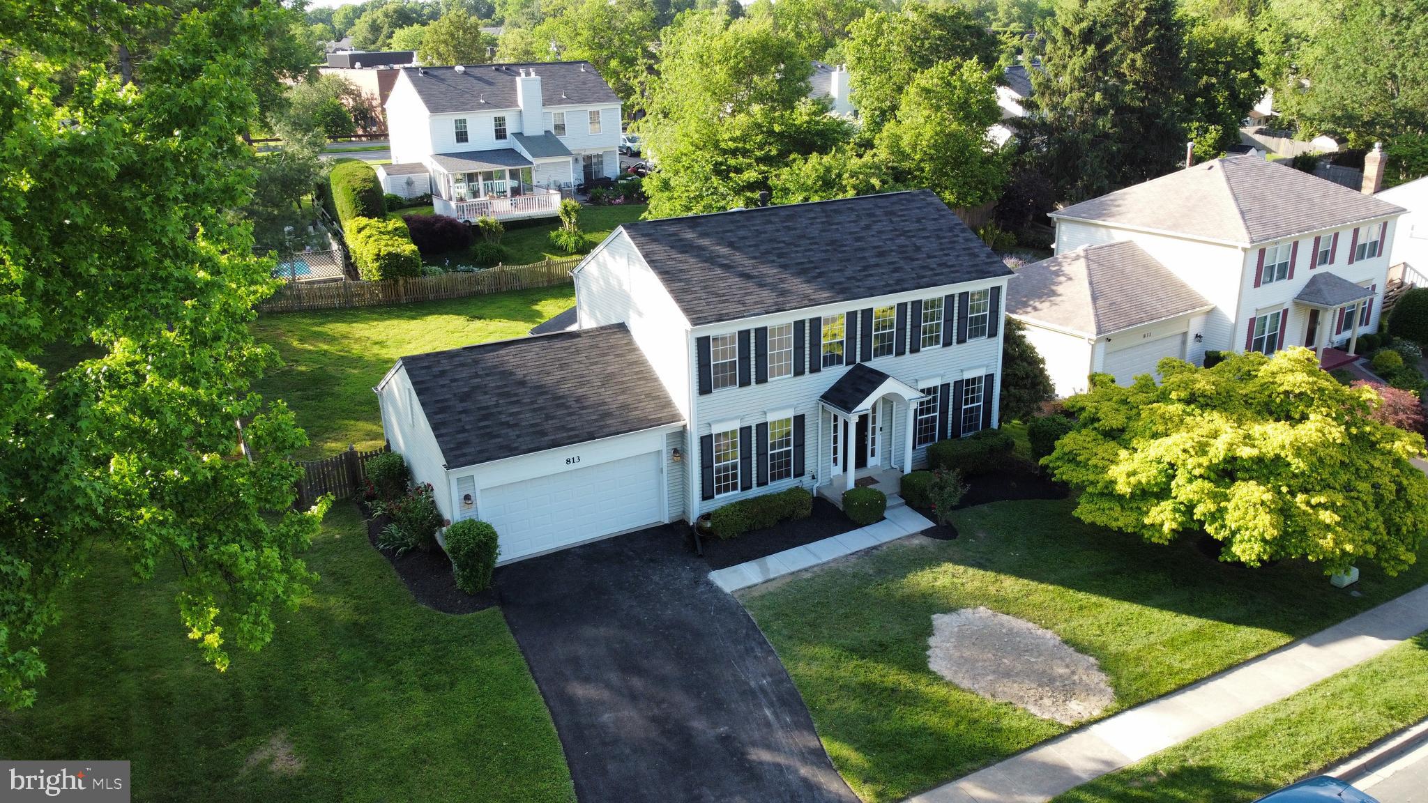 813 Pointer Ridge Drive Gaithersburg, MD 20878 - Photo 2 of 43 an aerial view of a house with a garden