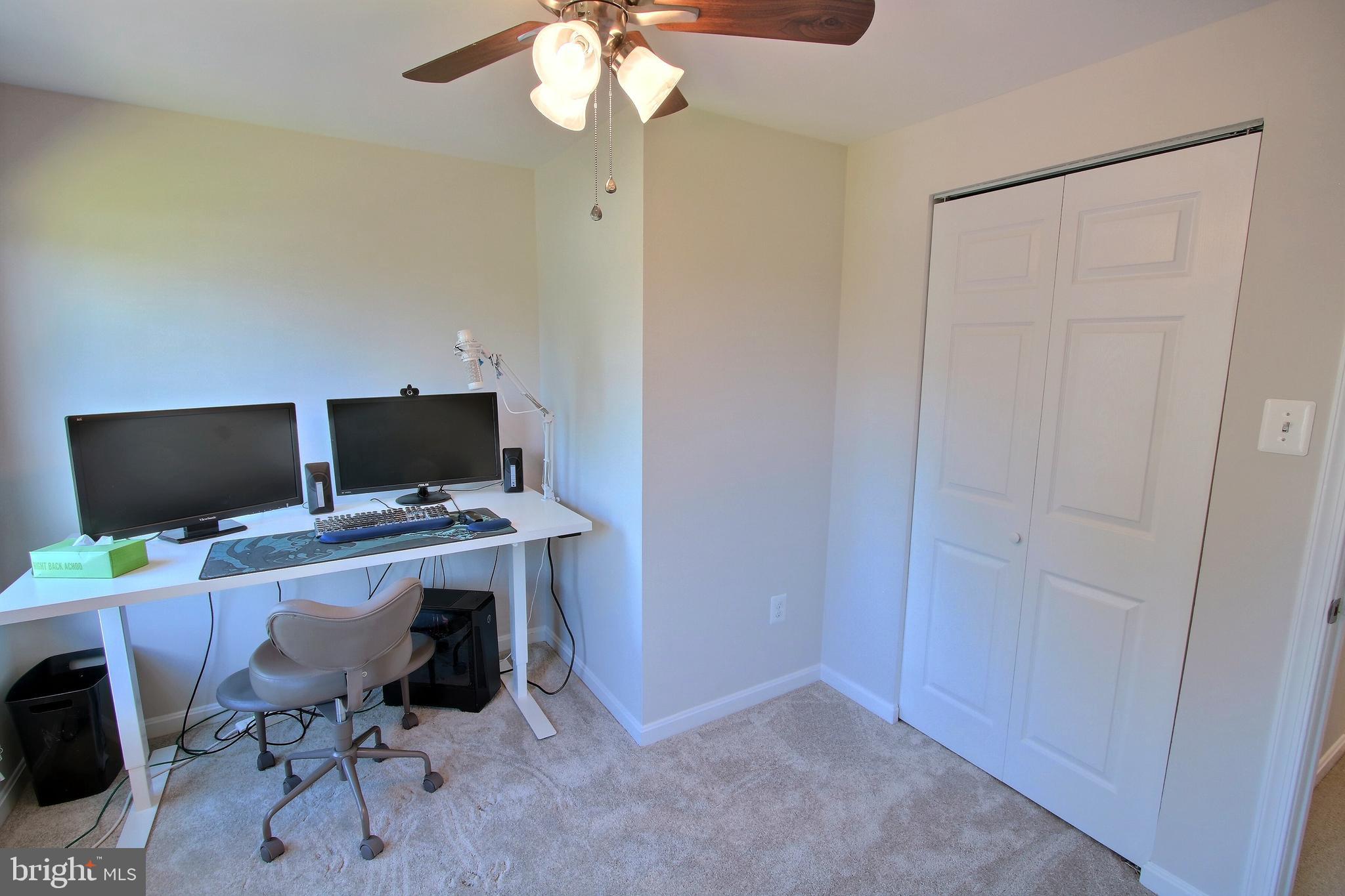 813 Pointer Ridge Drive Gaithersburg, MD 20878 - Photo 28 of 43 a view of a workspace with furniture