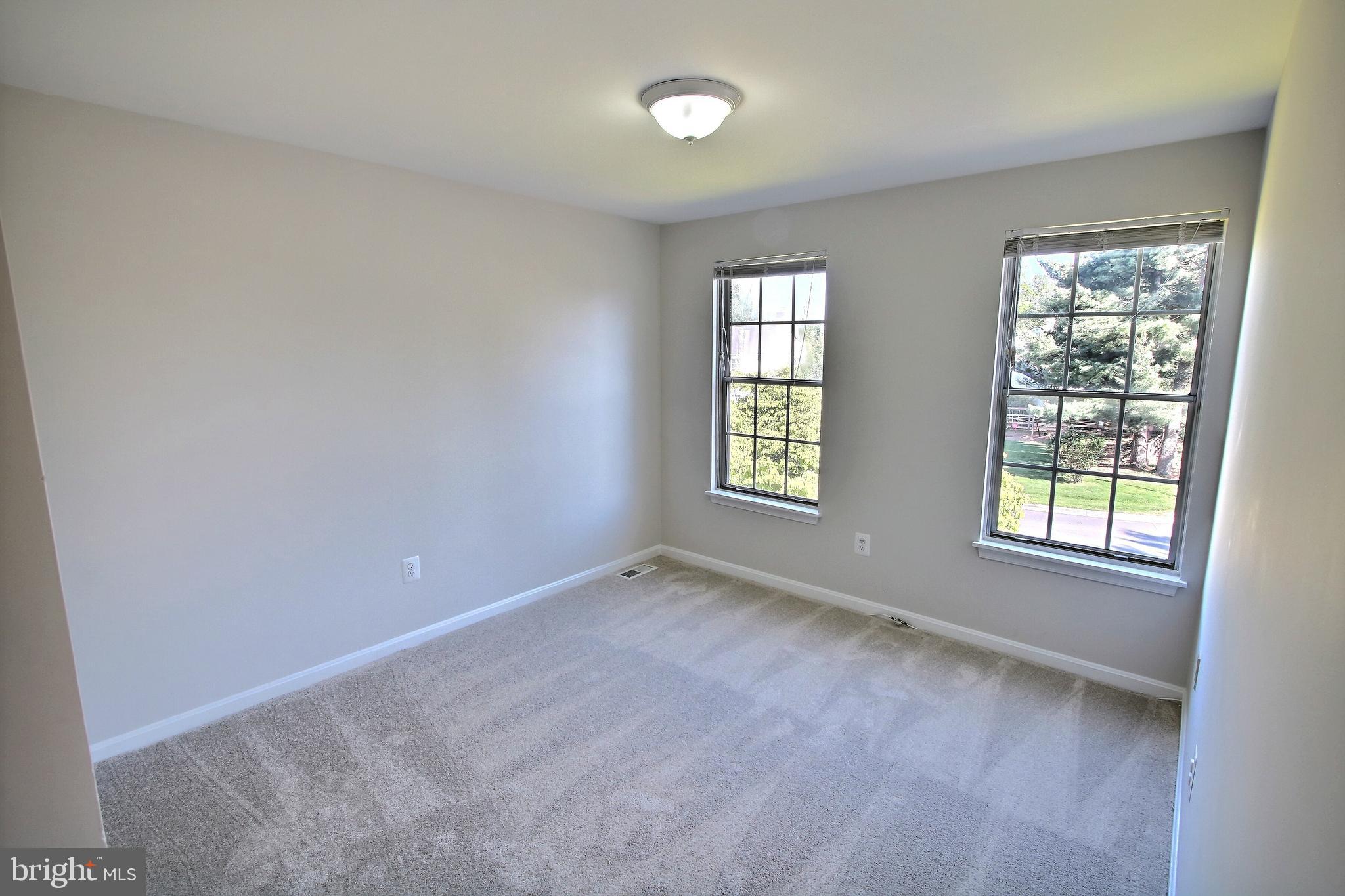 813 Pointer Ridge Drive Gaithersburg, MD 20878 - Photo 29 of 43 an empty room with windows