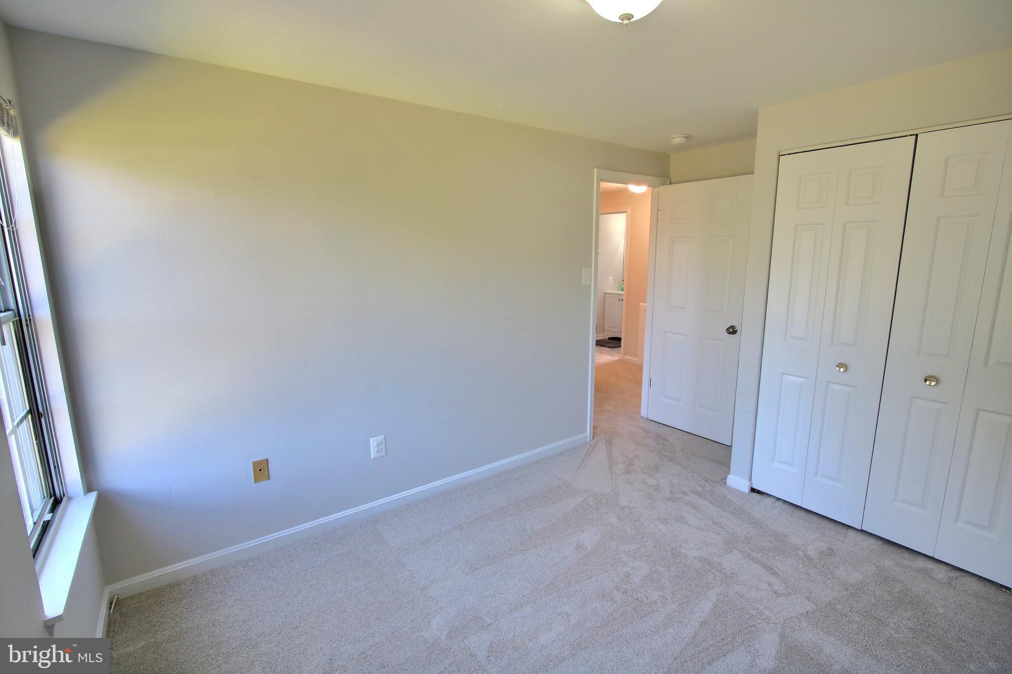813 Pointer Ridge Drive Gaithersburg, MD 20878 - Photo 30 of 43 a view of an empty room