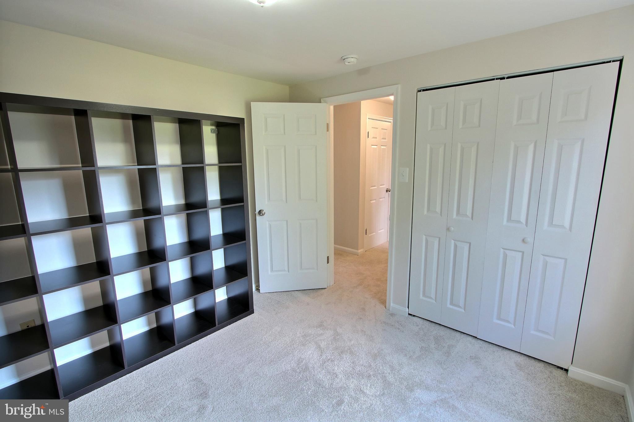 813 Pointer Ridge Drive Gaithersburg, MD 20878 - Photo 32 of 43 a view of a black and white walls