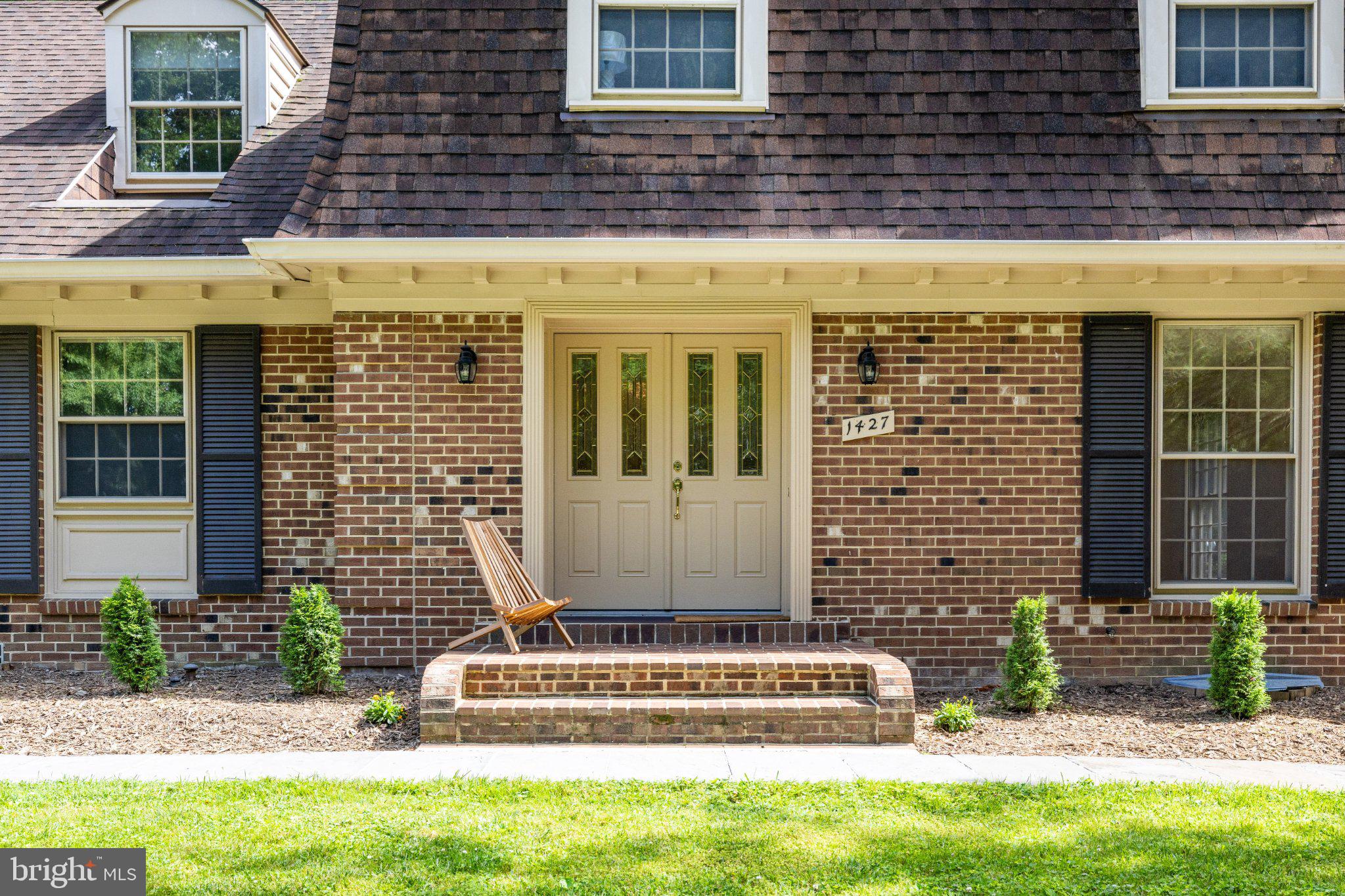 1427 Laurel Hill Road Vienna, VA 22182 - Photo 4 of 57 Charming brick facade with inviting entry.