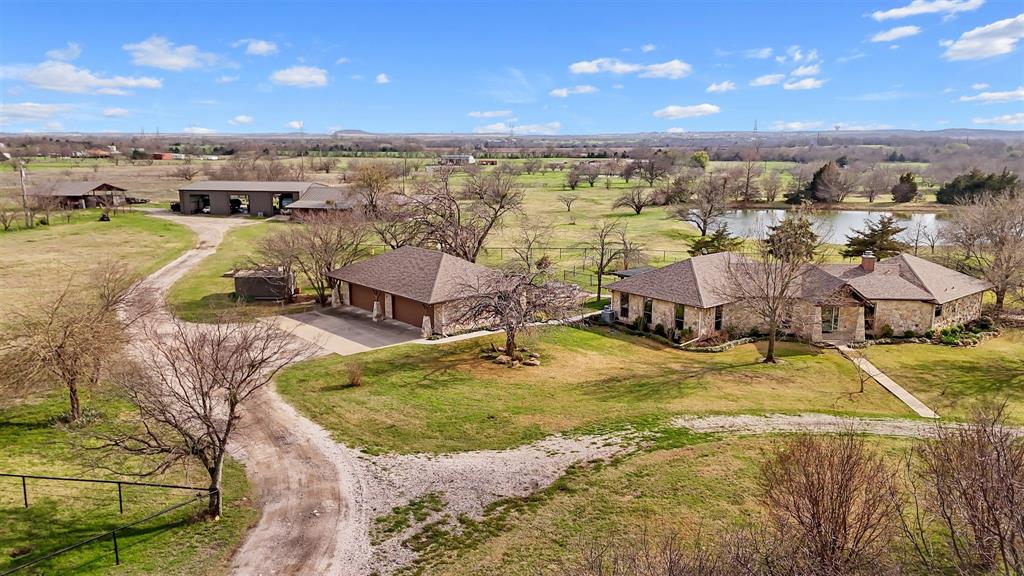 9711 Jim Christal Road Krum, TX 76249 - Photo 1 of 38 a view of a city