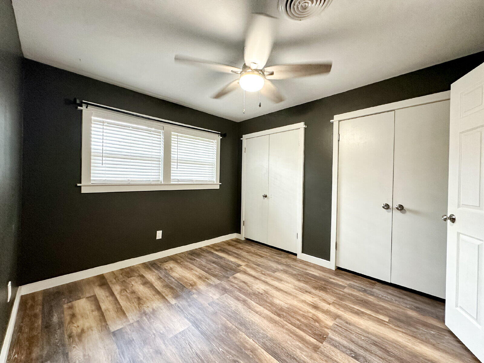 2608 Raleigh Avenue Lubbock, TX 79410 - Photo 4 of 23 a view of a livingroom with a ceiling fan and window