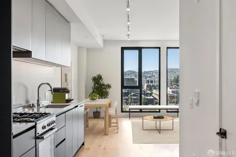 a living room with furniture and window