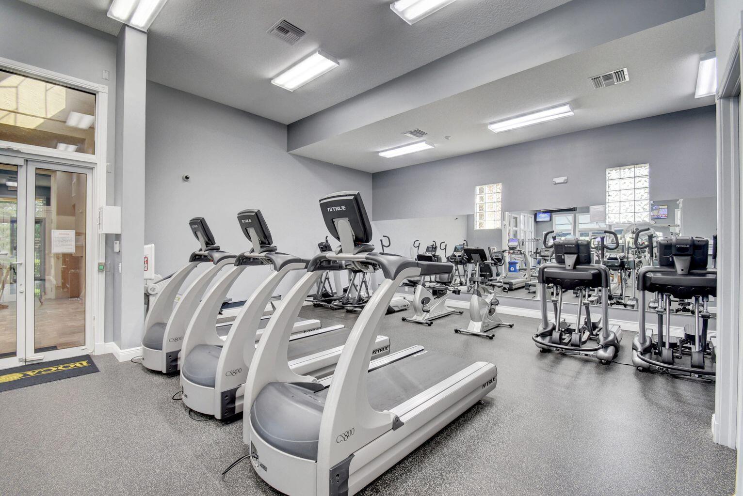 12364 Clearfalls Drive Boca Raton, FL 33428 - Photo 28 of 32 a view of a room with gym equipment