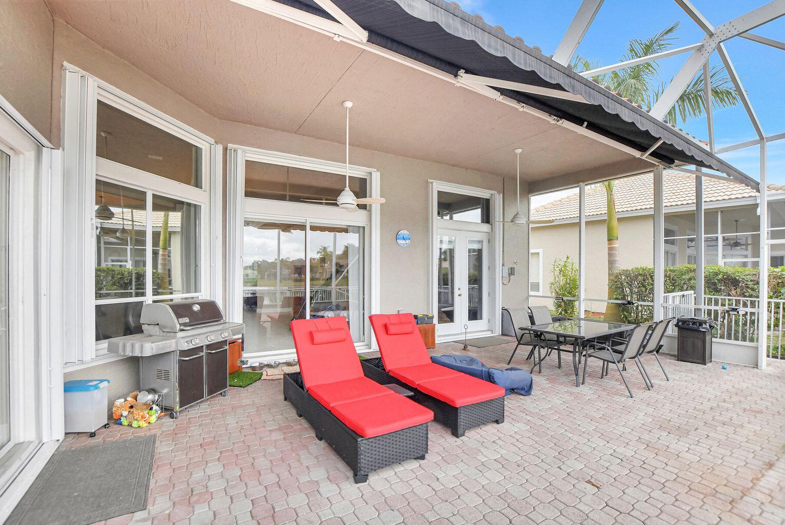 12364 Clearfalls Drive Boca Raton, FL 33428 - Photo 29 of 32 a living room filled with furniture