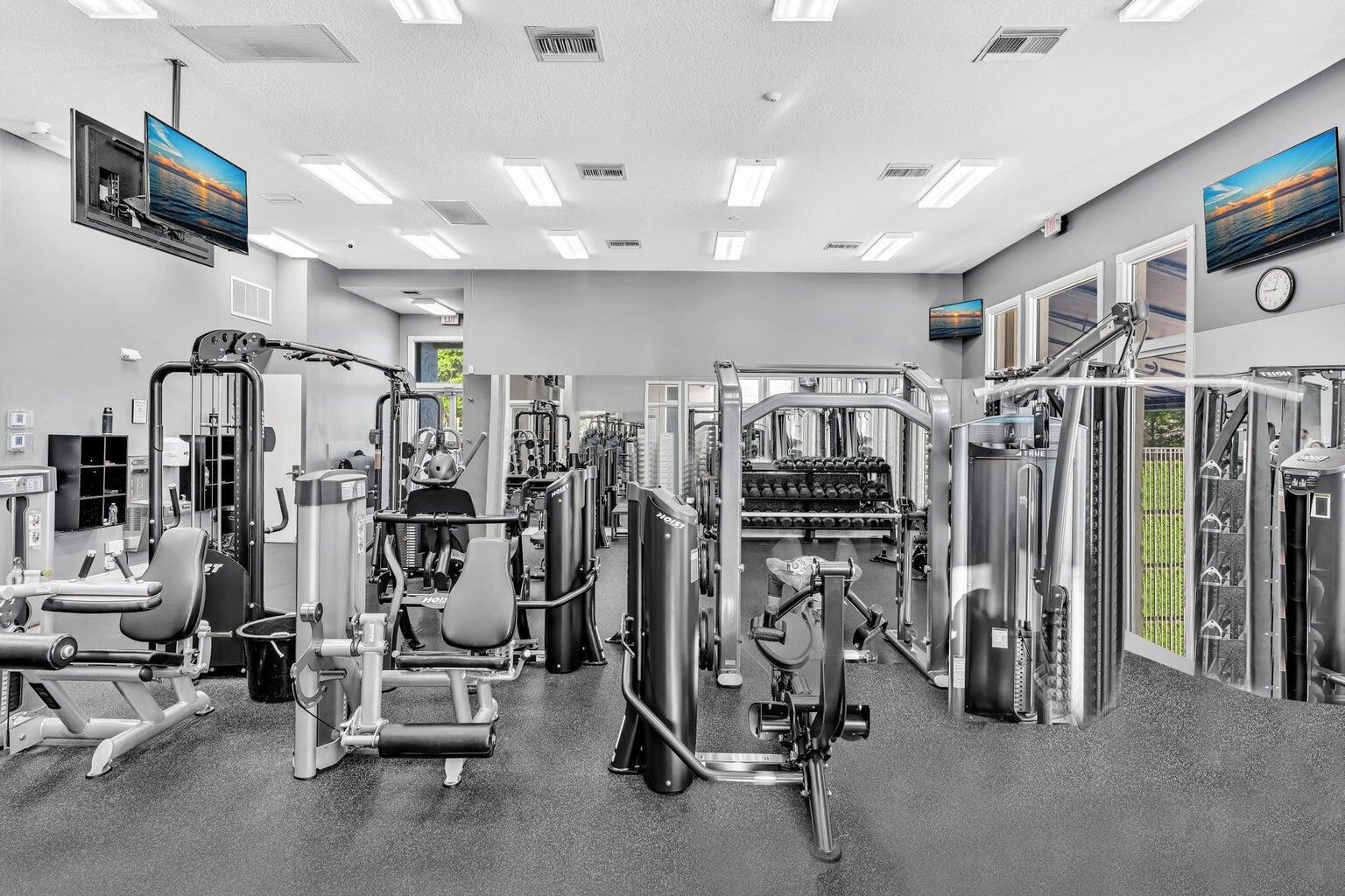 12364 Clearfalls Drive Boca Raton, FL 33428 - Photo 31 of 32 a view of a room with gym equipment