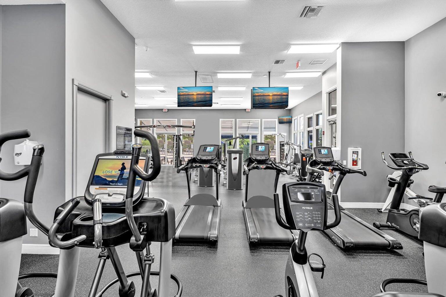 12364 Clearfalls Drive Boca Raton, FL 33428 - Photo 32 of 32 a view of a room with gym equipment