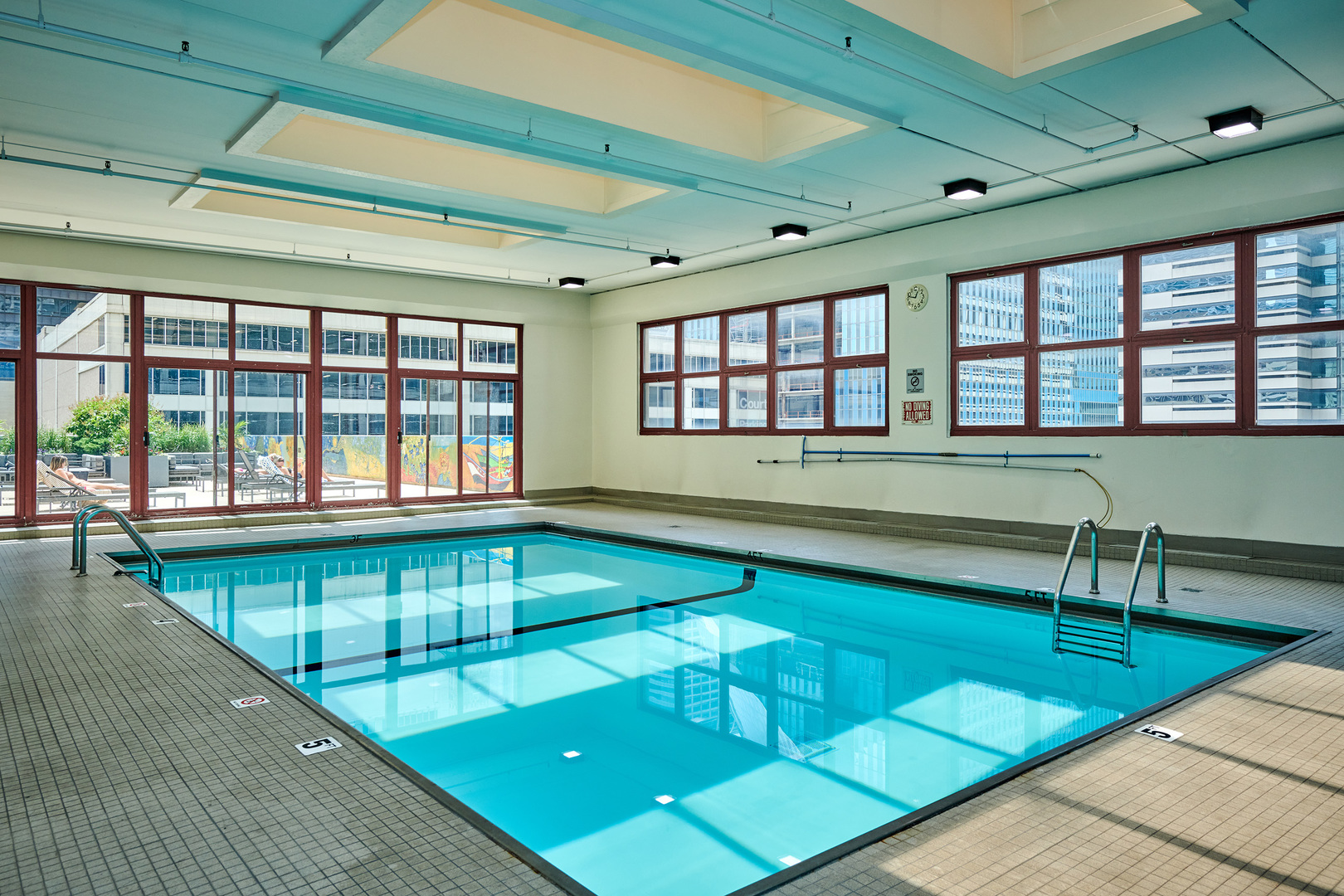 200 North Dearborn Street, Unit 1808 Chicago, IL 60601 - Photo 32 of 32 a swimming pool with outdoor seating and a lots of space