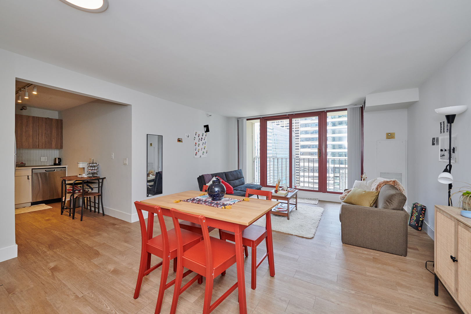 200 North Dearborn Street, Unit 1808 Chicago, IL 60601 - Photo 8 of 32 a living room with furniture and a large window