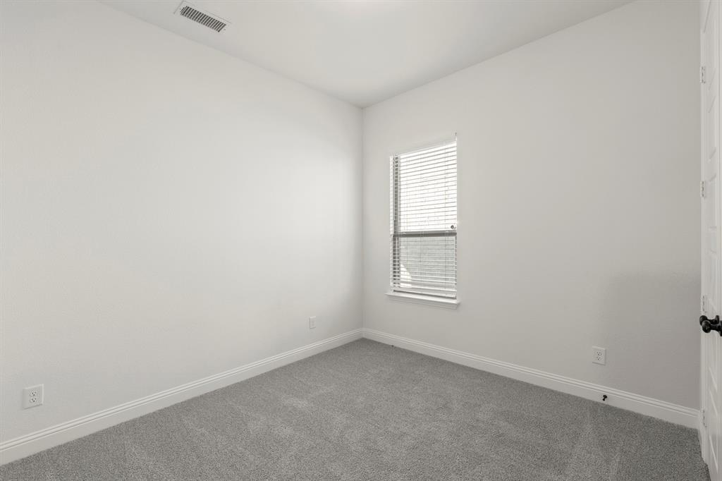 2543 Brunswick Way Allen, TX 75013 - Photo 12 of 34 an empty room with a window