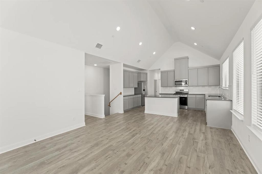 2543 Brunswick Way Allen, TX 75013 - Photo 13 of 38 a view of kitchen with wooden floor