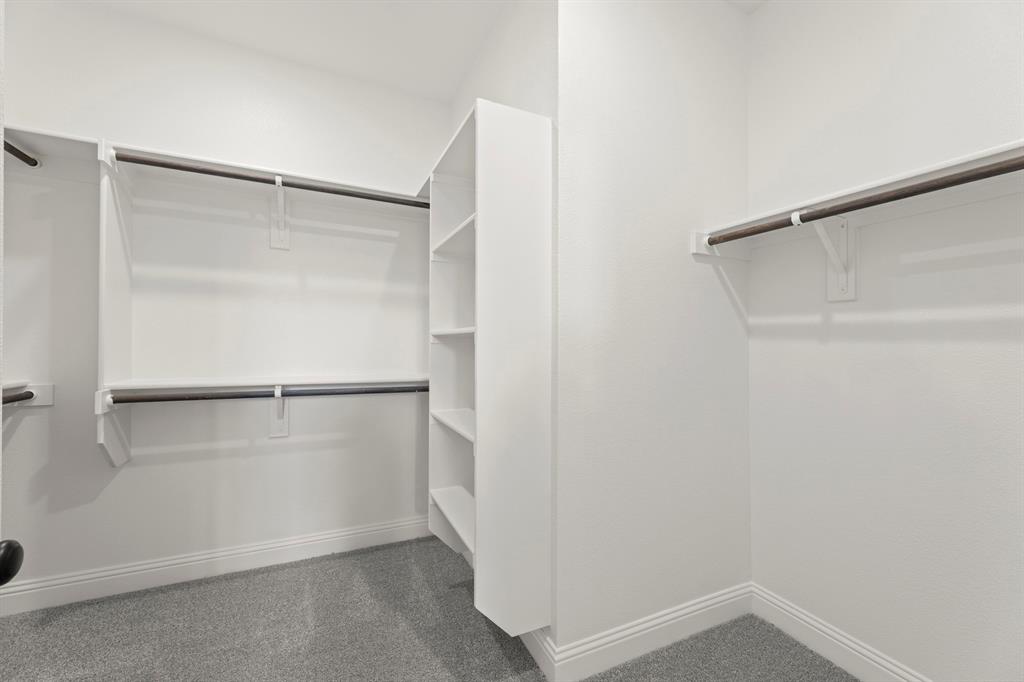 2543 Brunswick Way Allen, TX 75013 - Photo 29 of 34 a view of an empty walk in closet