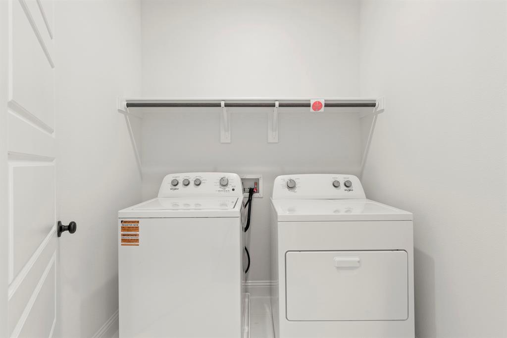 2543 Brunswick Way Allen, TX 75013 - Photo 30 of 34 a utility room with dryer and washer
