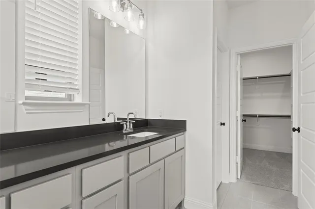 a close view of sink and a vanity