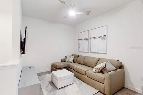 a living room with furniture and a couch