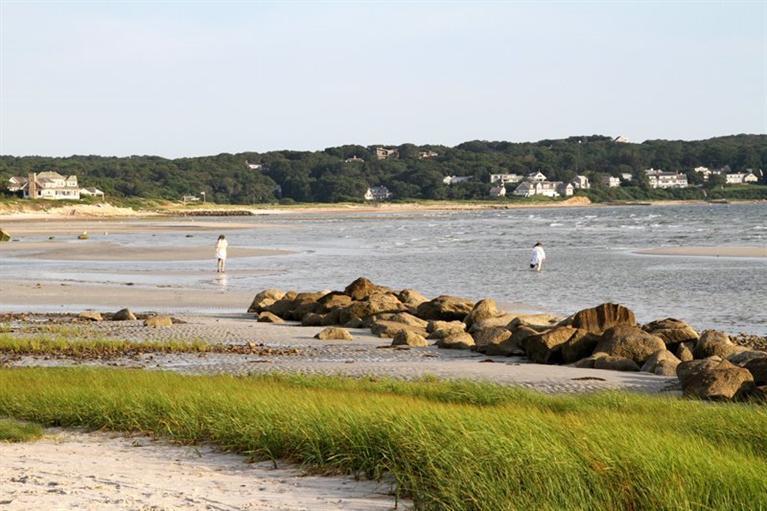 128 Little Neck Bars Road Falmouth, MA 02540 - Photo 8 of 35 a view of a lake with a mountain