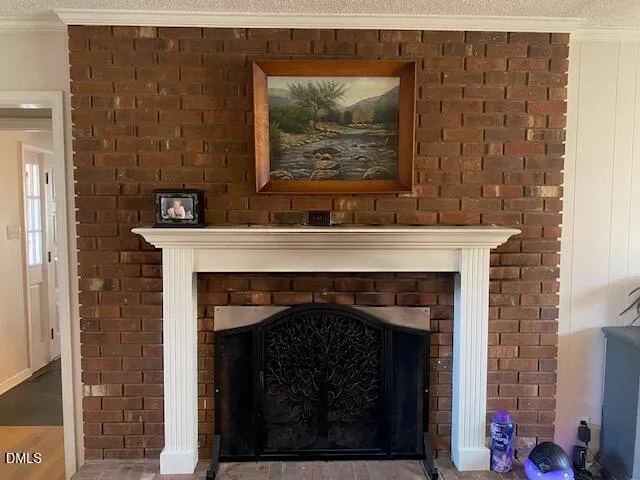 a living room with a fireplace