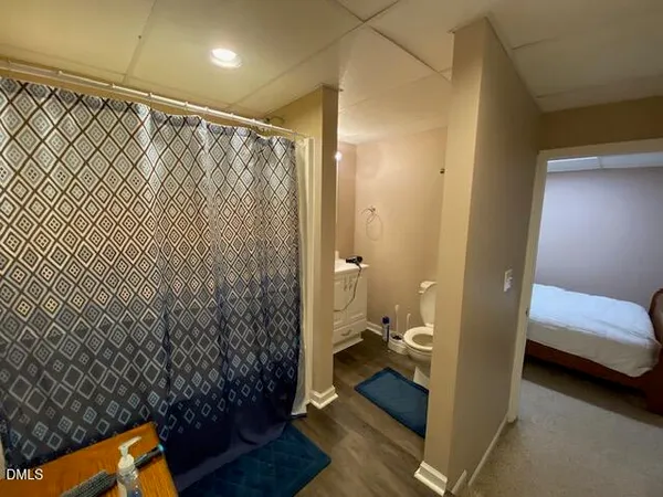 a bathroom with a sink and a shower