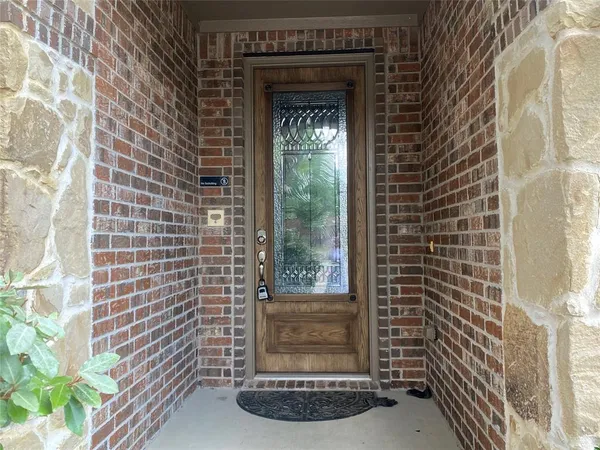 a view of a door front of a house