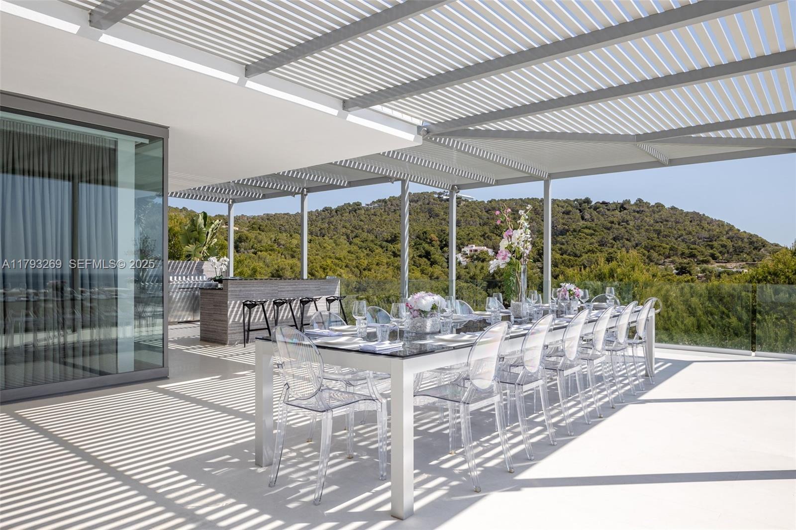 North Cathedral City undefined, FL 00000 - Photo 19 of 70 a view of a patio with a dining table and chairs